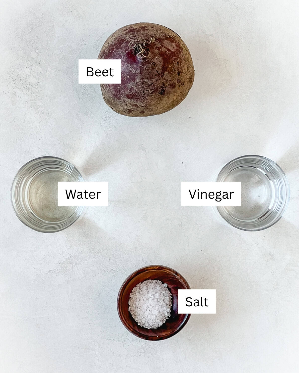 Pickled beet with no sugar ingredients laid out with labels. 
