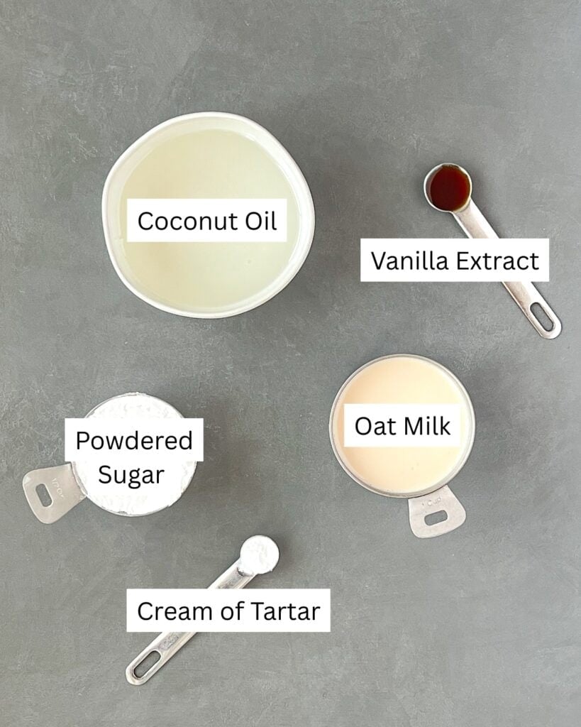 Ingredients for oat milk whipped cream laid out separately and labeled.