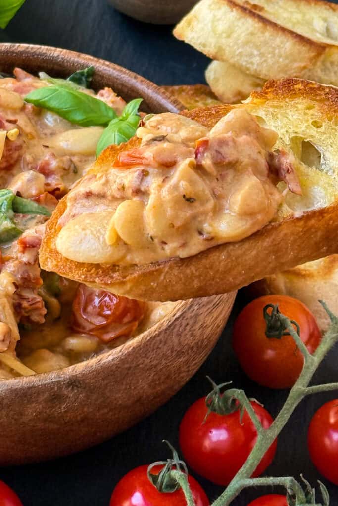 Marry me butter beans on a toasted baguette slice.